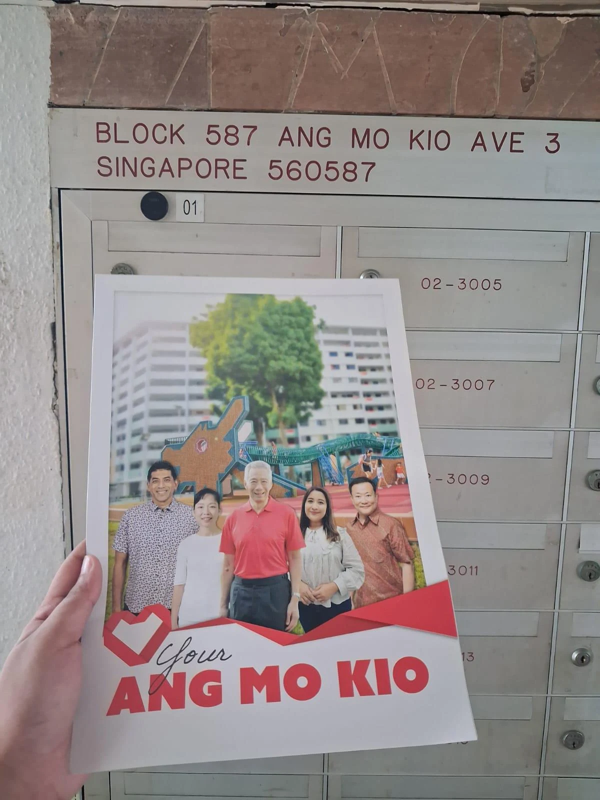 Campaign material photographed at the letterboxes of Block 587 Ang Mo Kio Avenue 3.