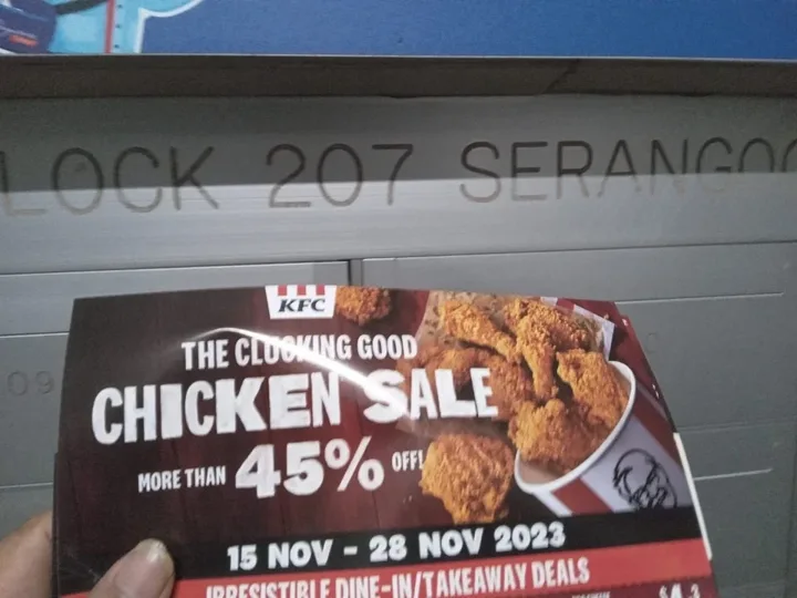A KFC promotion photographed at a Serangoon HDB block.